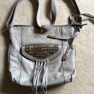 Lucky Brand shoulder bag. Gray toned, studs tassel